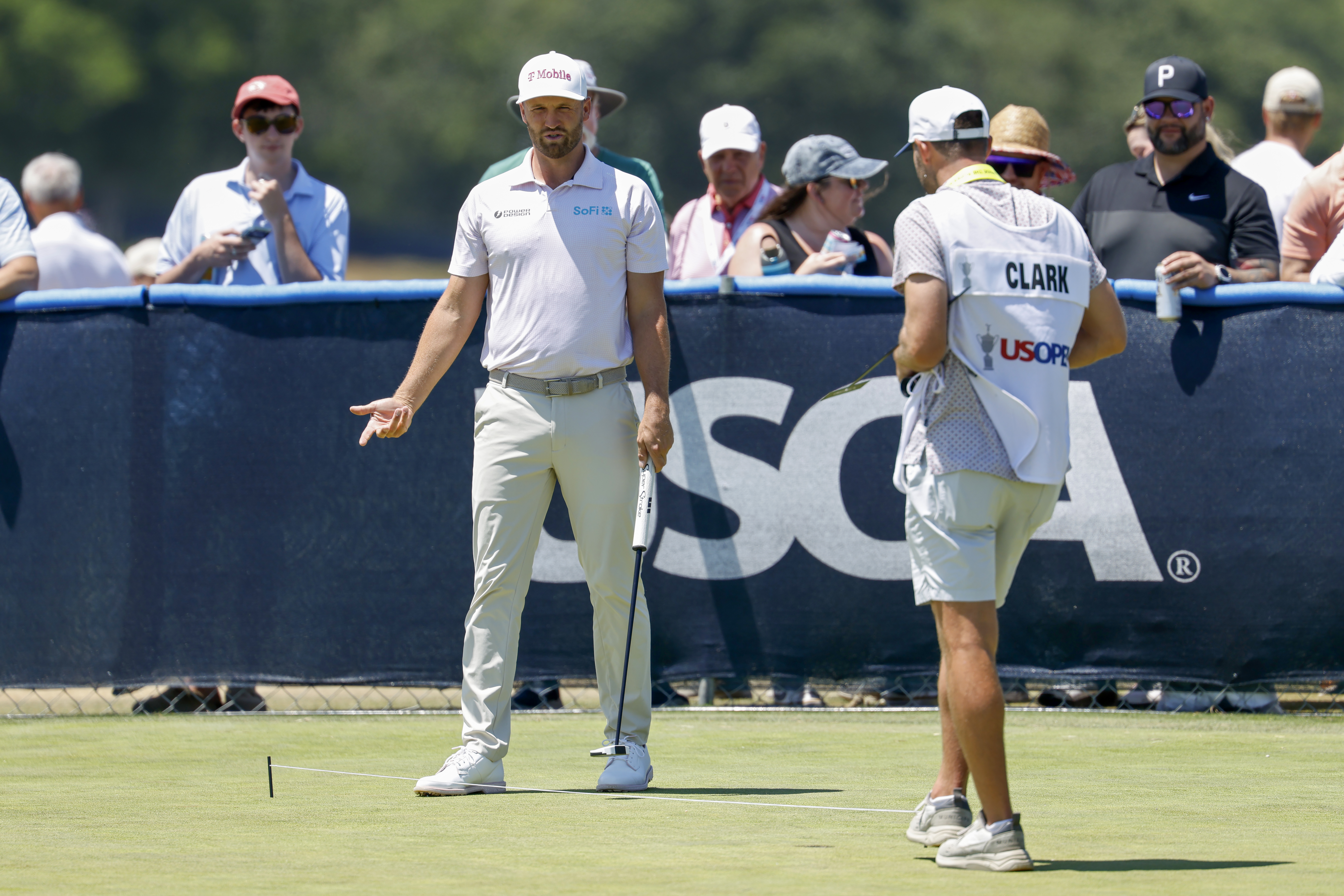Wyndham Clark on the practice putting green ahead of the US Open