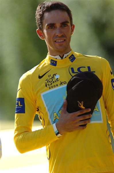 Spaniard Alberto Contador listens to his national anthem