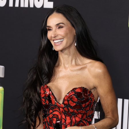 Demi Moore at the Los Angeles premiere of "The Substance" held at the Directors Guild of America Theater on September 16, 2024 in Los Angeles, California wearing a red disco dress