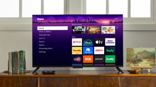 Roku TV on stand in living room