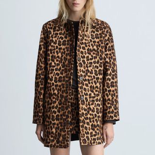 Flat lay image of leopard print coat 