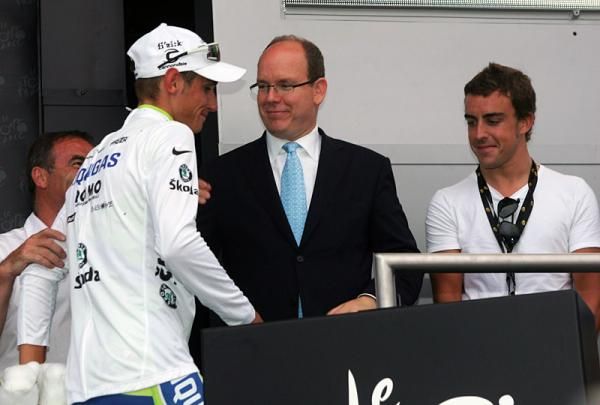 Roman Kreuziger, leader of the best young rider classification, is congratulated by Prince Albert of Monaco.