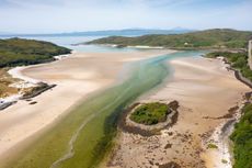 Aerial view from drone of Silver Sands of Morar on the River Morar and Morar Bay at Morar west of Scotland, UK