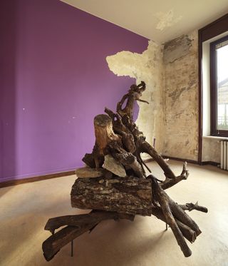wood sculpture in a room