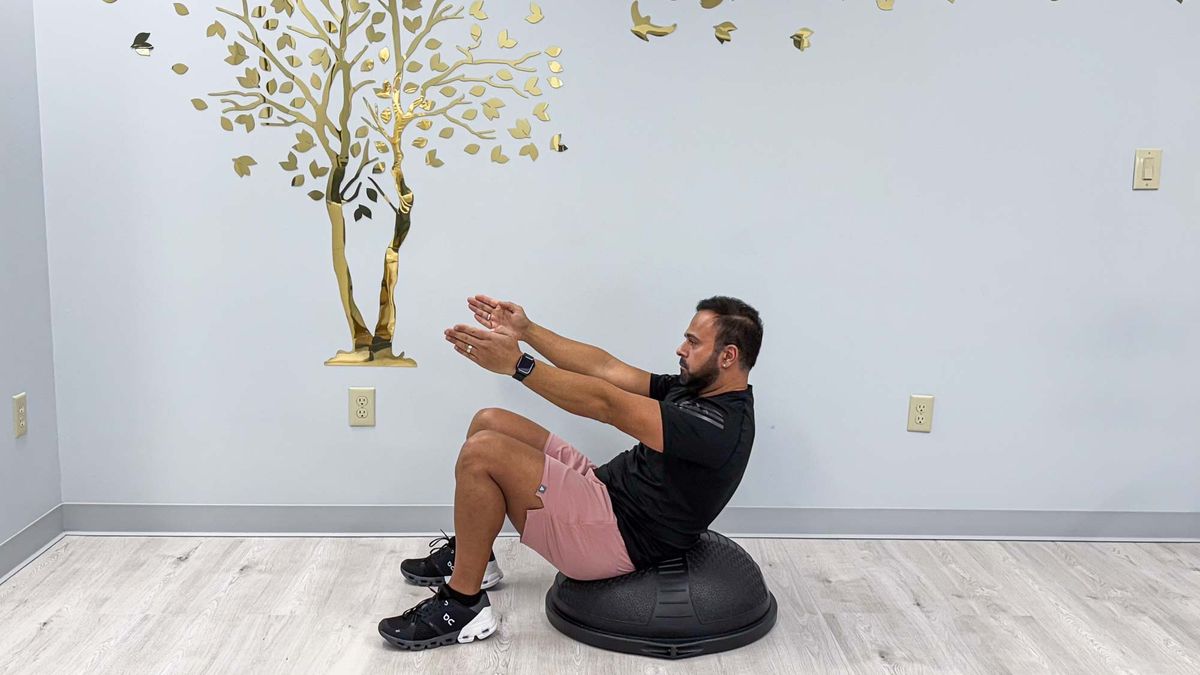 Nico Gonzalez finishing the BOSU dead bug to stand exercise