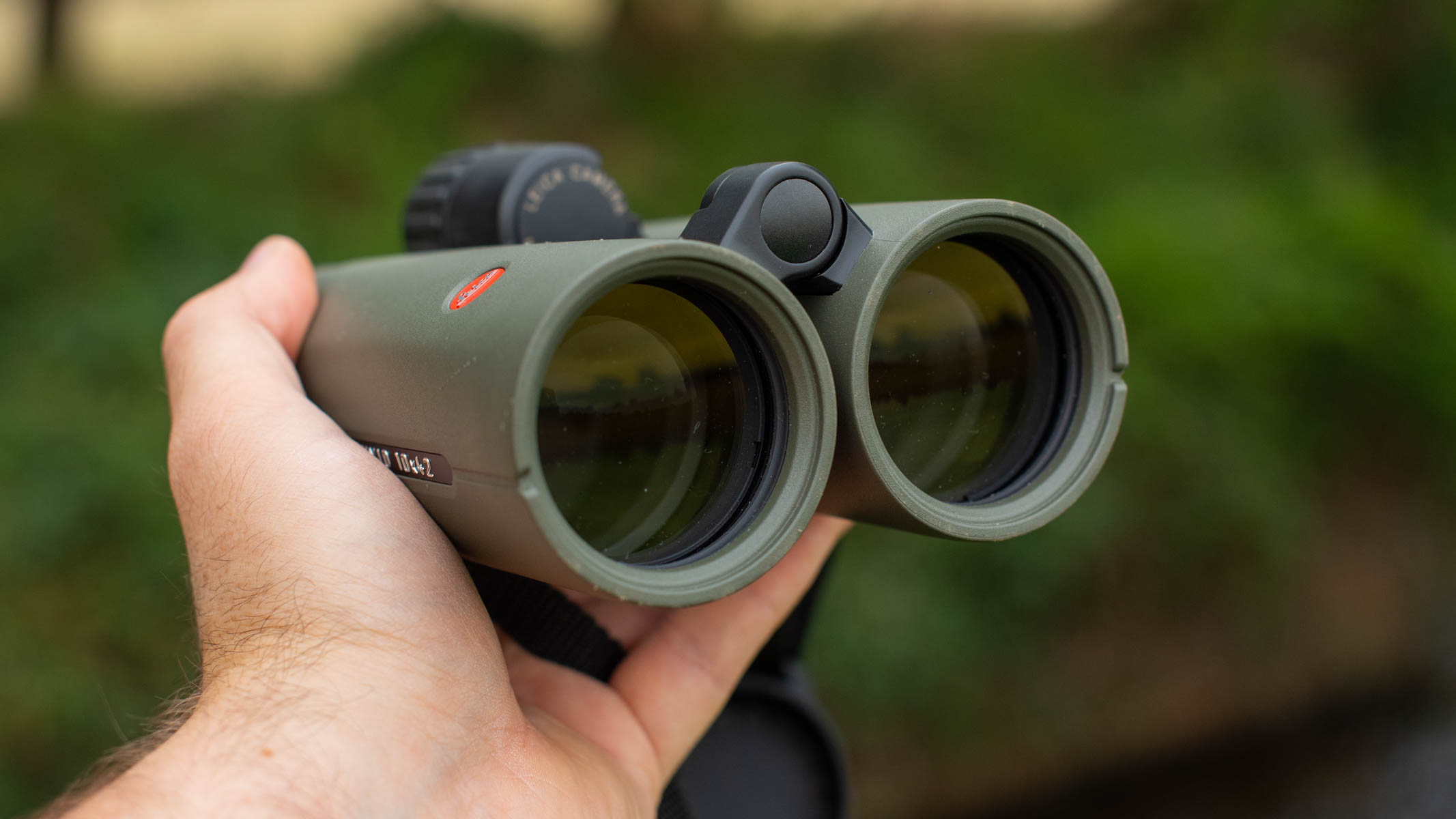 Close-up of the lenses of the Leica Noctivid 10x42 binoculars.