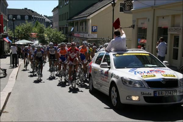 The peloton heads through the neutral zone.