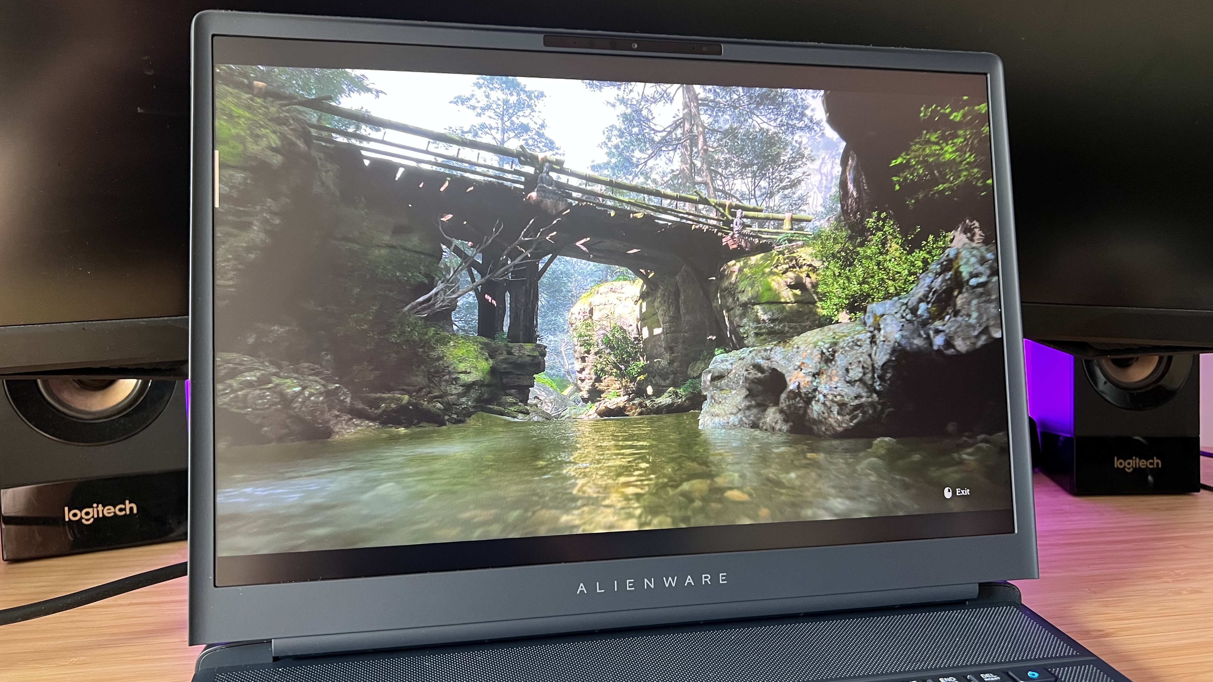 Display of Alienware 16 Area-51 gaming laptop showing Black Myth Wukong benchmark running