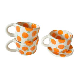 Handmade orange mugs