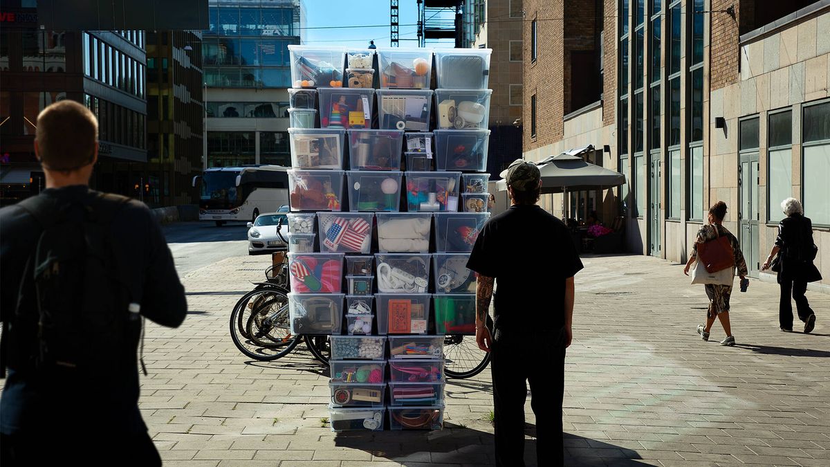 Ikea billboard advert with storage boxes hidden behind it