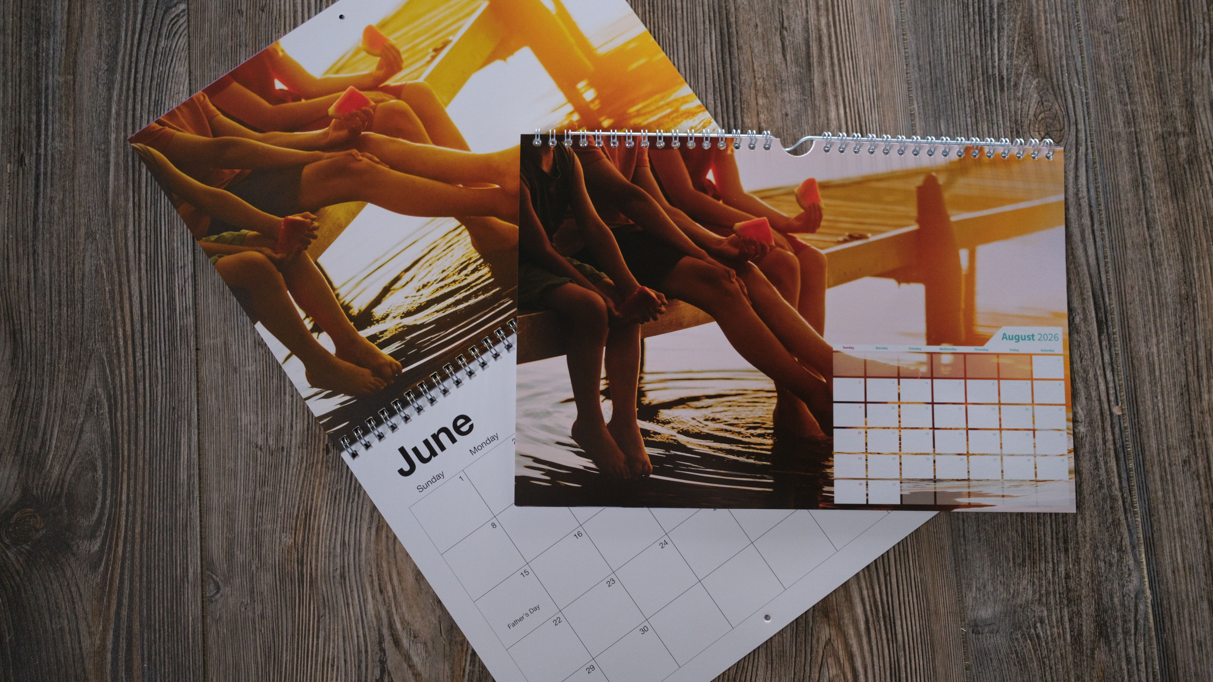 A photo calendar from Shutterfly on a wood background