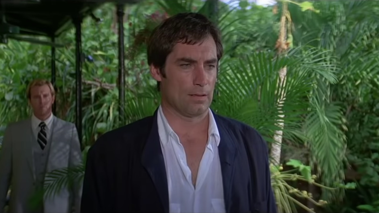 Timothy Dalton stands surprised in Licence To Kill.
