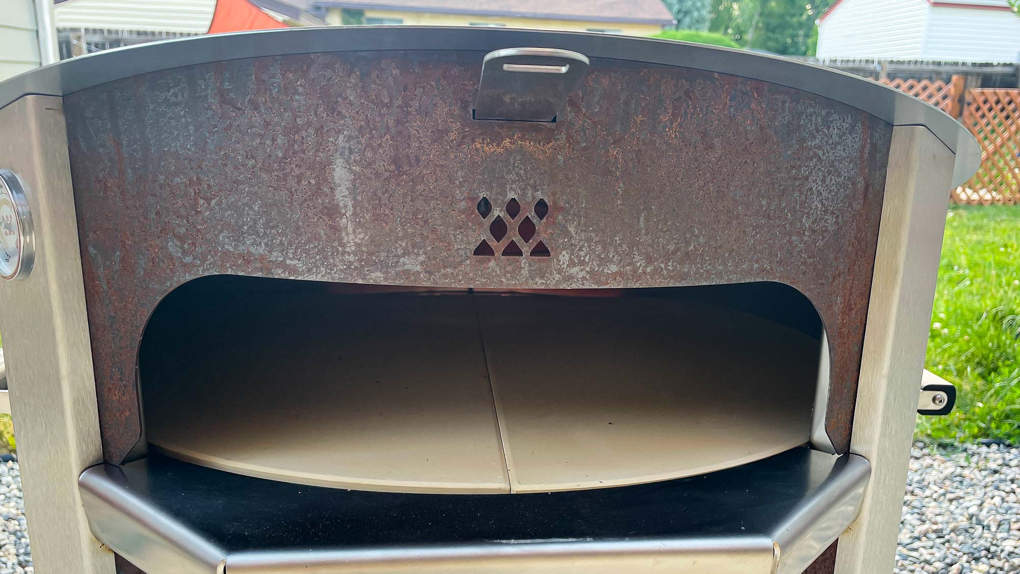 Breeo Live-fire pizza oven bundle in back yard