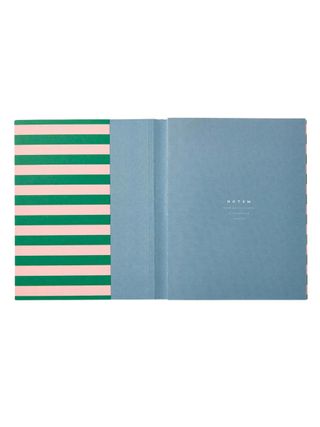 A stripy notebook with nostalgic colors.