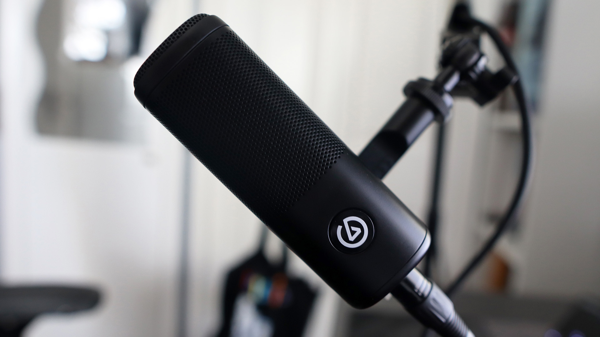 Elgato Wave DX XLR microphone on a mic arm