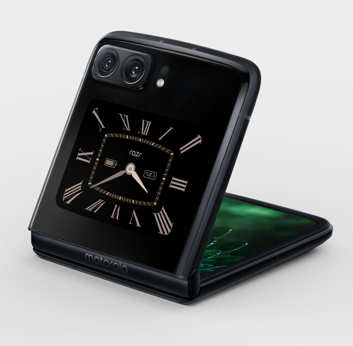 The Motorola Razr 2022 half-open with a brown clock face on the secondary display