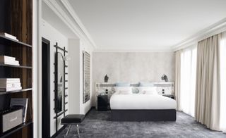 hotel bedroom with neutral and grey interior