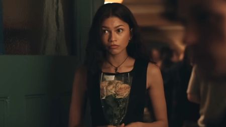 MG looking uncertain holding flowers in Spider-Man: Brand New Day