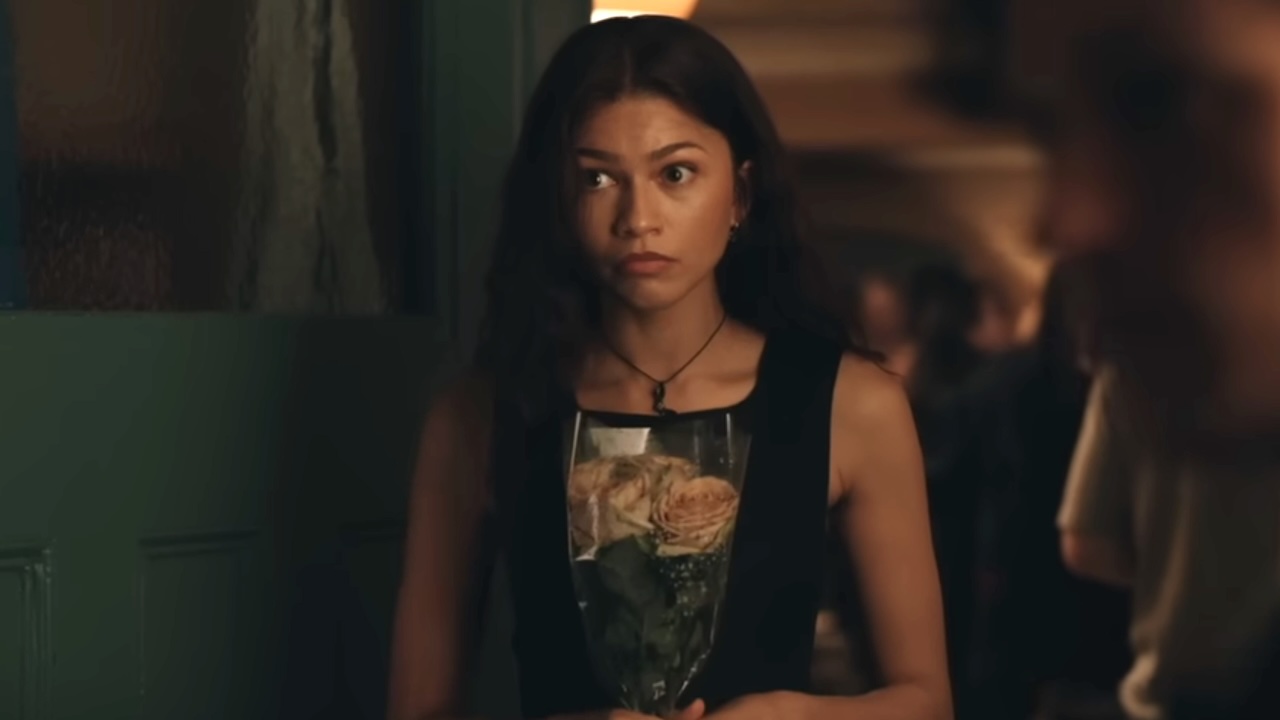 MG looking uncertain holding flowers in Spider-Man: Brand New Day