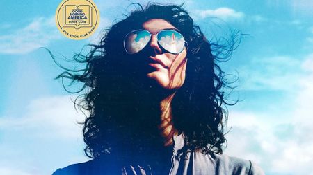 A woman with sunglasses on the cover of Atmosphere