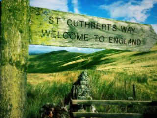 Welcome to England signpost on the Scottish border along St Cuthbert's Way.