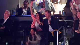 Prince Harry and Meghan Markle watch the Lakers basketball