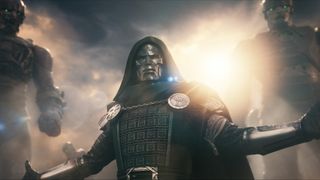 Doctor Doom holding up his arms as he raises two Sentinels in Avengers: Doomsday