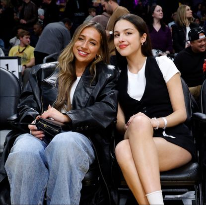 Olivia Rodrigo and Tate McRae attend the basketball game between the Los Angeles Lakers and Brooklyn Nets.