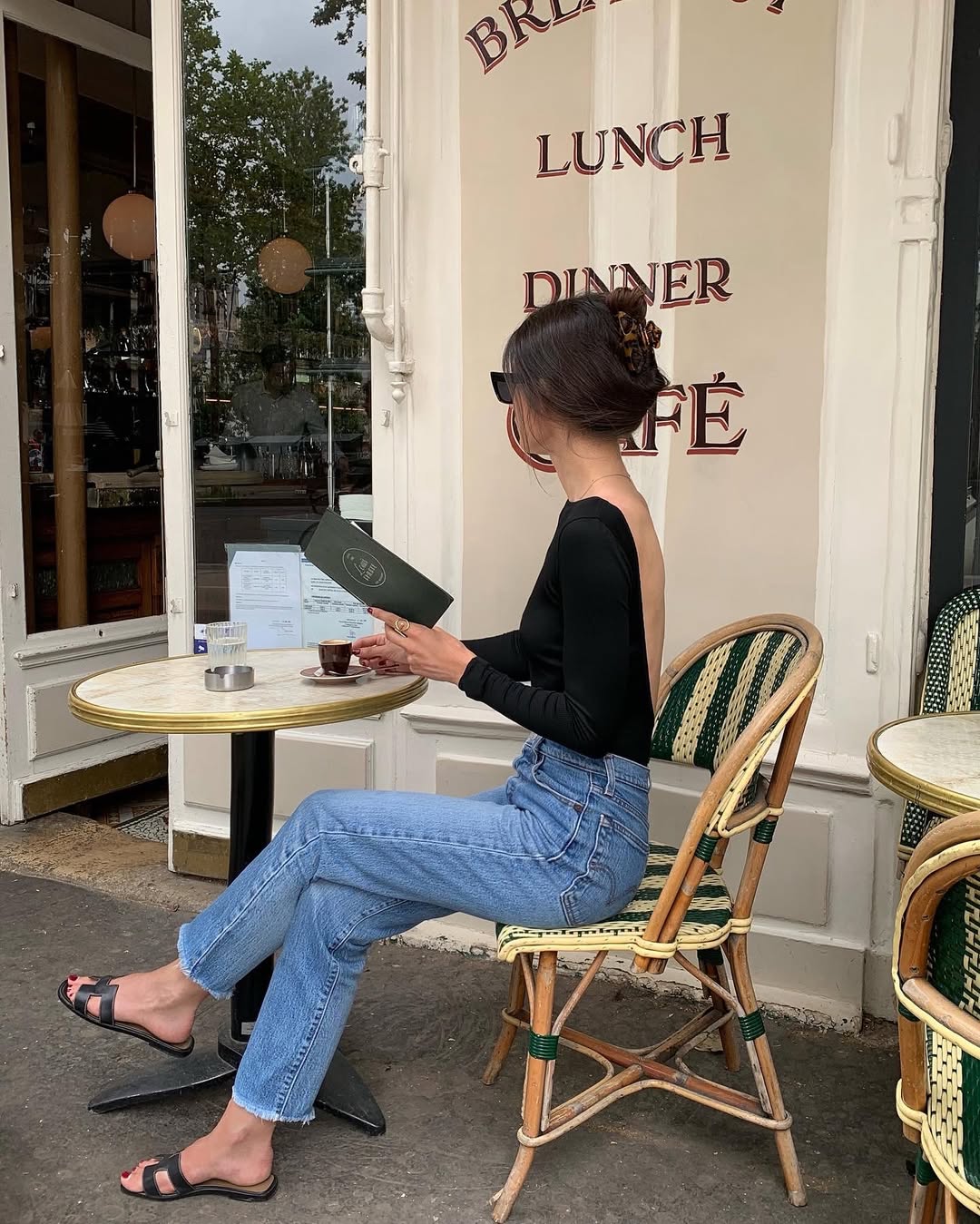 Woman in Paris with claw clip in hair.