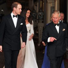 Prince William and his father, King Charles, talk on William's wedding day with Kate Middleton