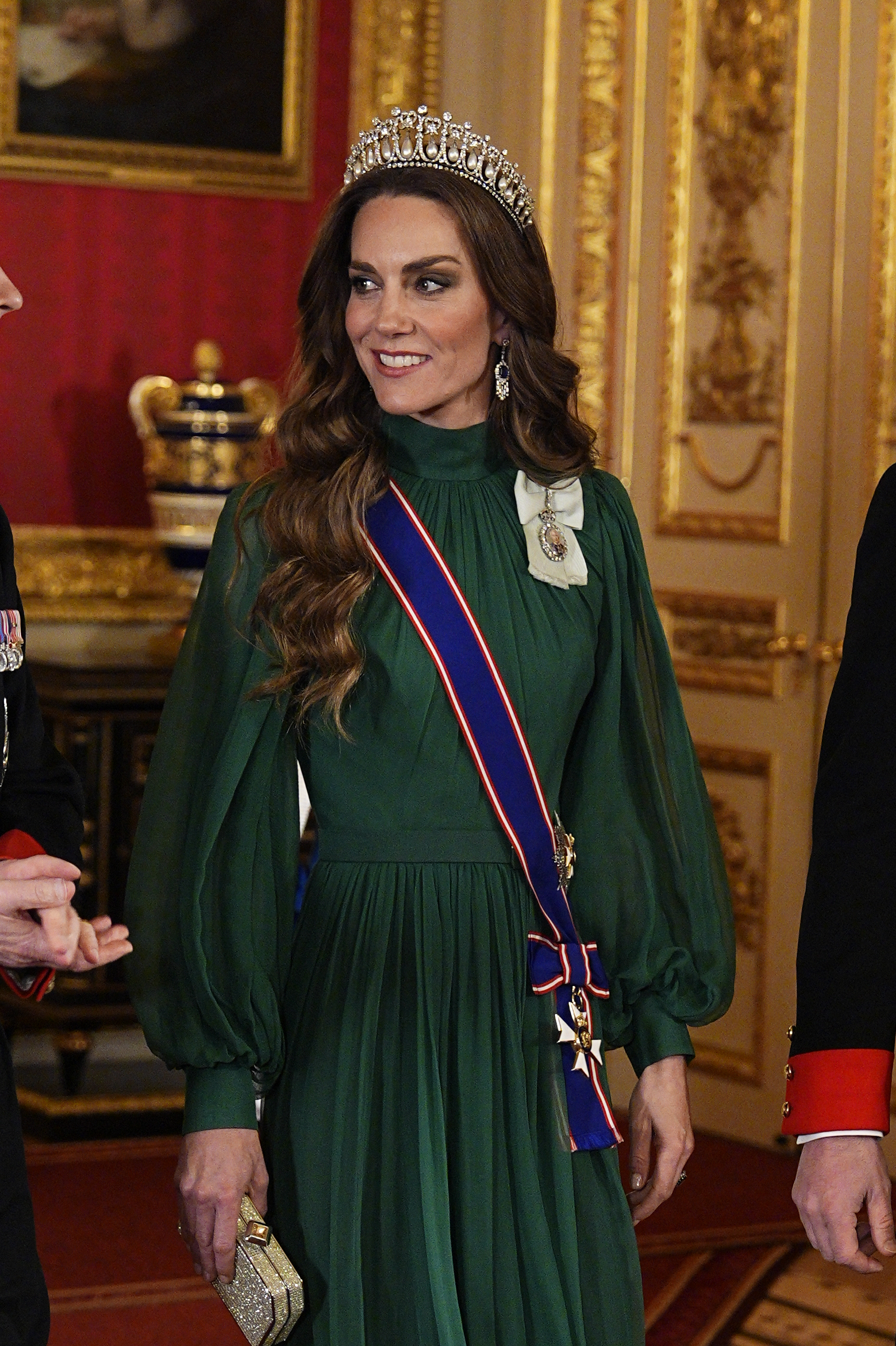 Princess Kate wearing a green evening dress and tiara