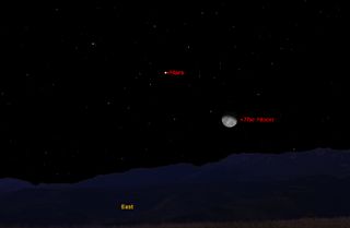 This sky map shows how the moon and planet Mars will appear together at 11 p.m. EST on Jan. 13, 2012 to observers in mid-northern latitudes.