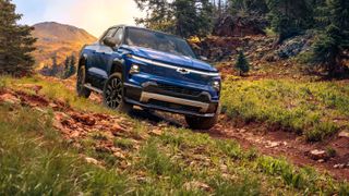 Chevrolet Silverado EV in woodland