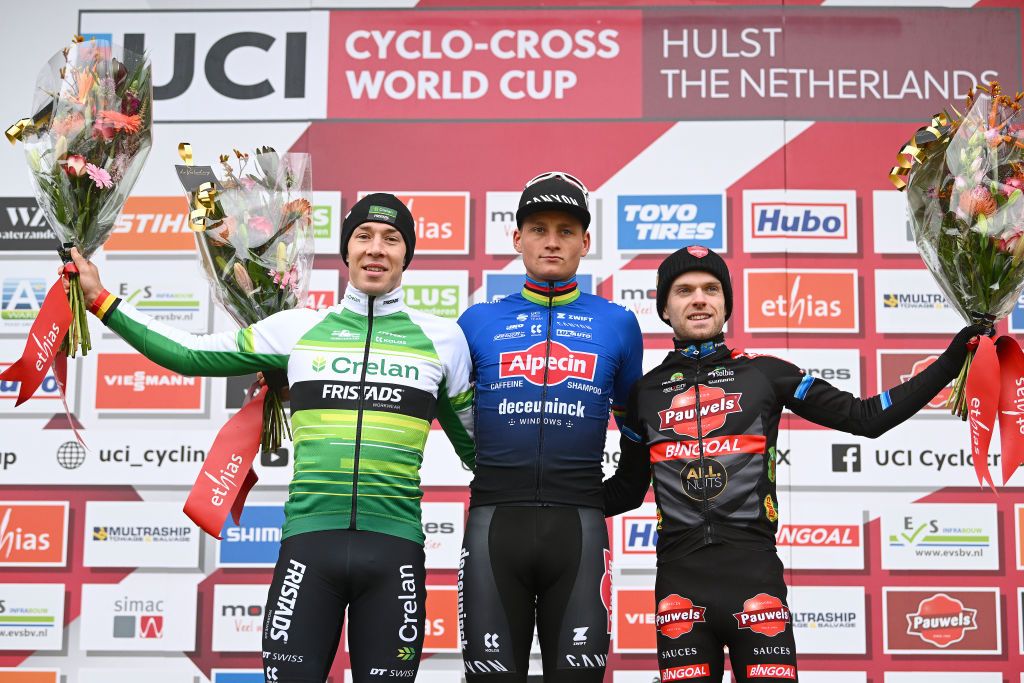 HULST NETHERLANDS NOVEMBER 27 LR Laurens Sweeck of Belgium and Team Crelan Fristads on second place race winner Mathieu Van Der Poel of The Netherlands and Team AlpecinDeceuninck and Eli Iserbyt of Belgium and Team Pauwels Sauzen Bingoal on third place pose on the podium ceremony after the 7th UCI Cyclocross World Cup Hulst 2022 Mens Elite CXWorldCup on November 27 2022 in Hulst Netherlands Photo by Luc ClaessenGetty Images