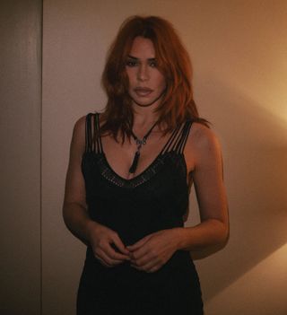 An image of Billie Piper with copper hair.