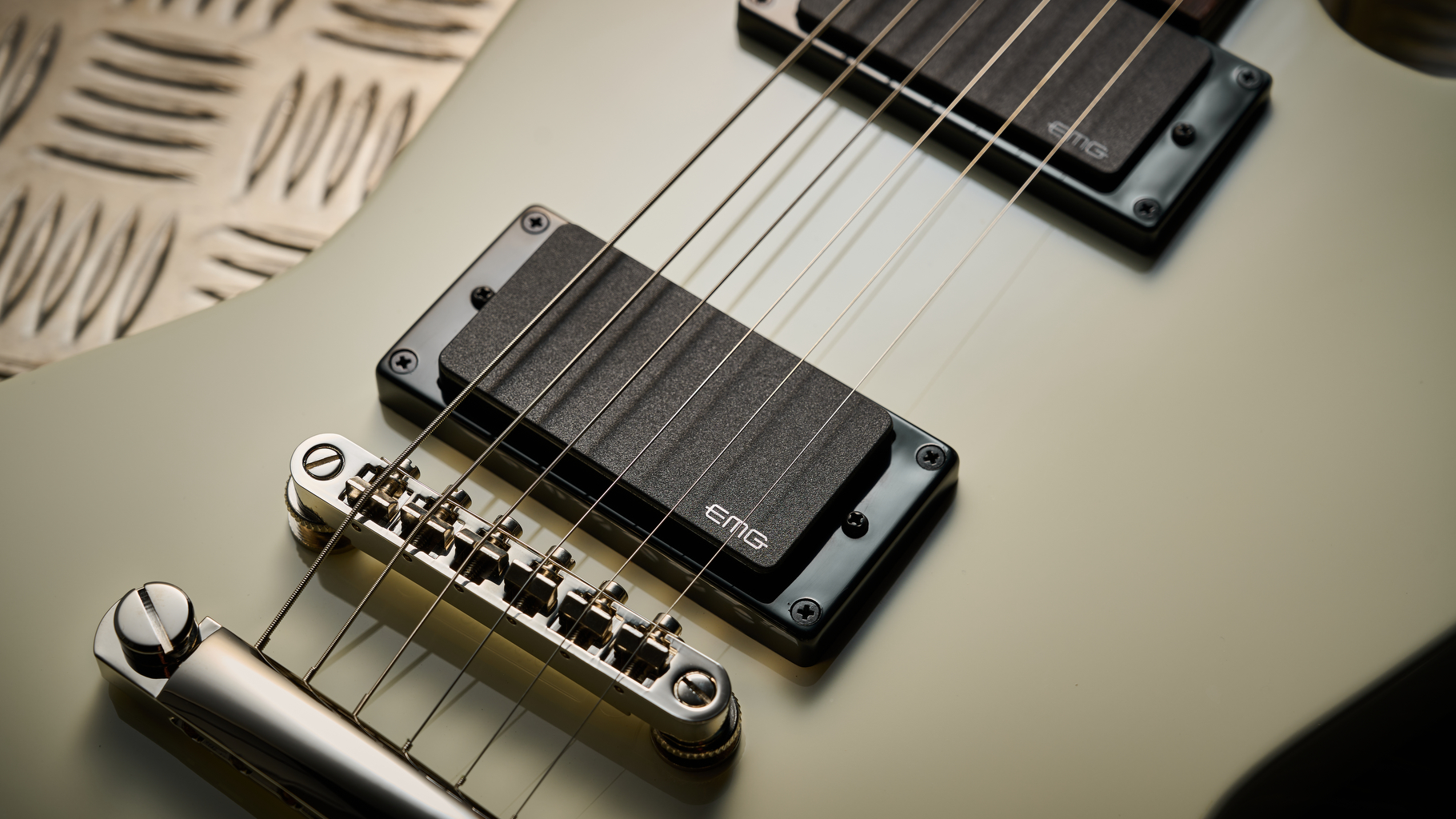 Close up of the EMG pickups on an Epiphone Explorer 80s EMG
