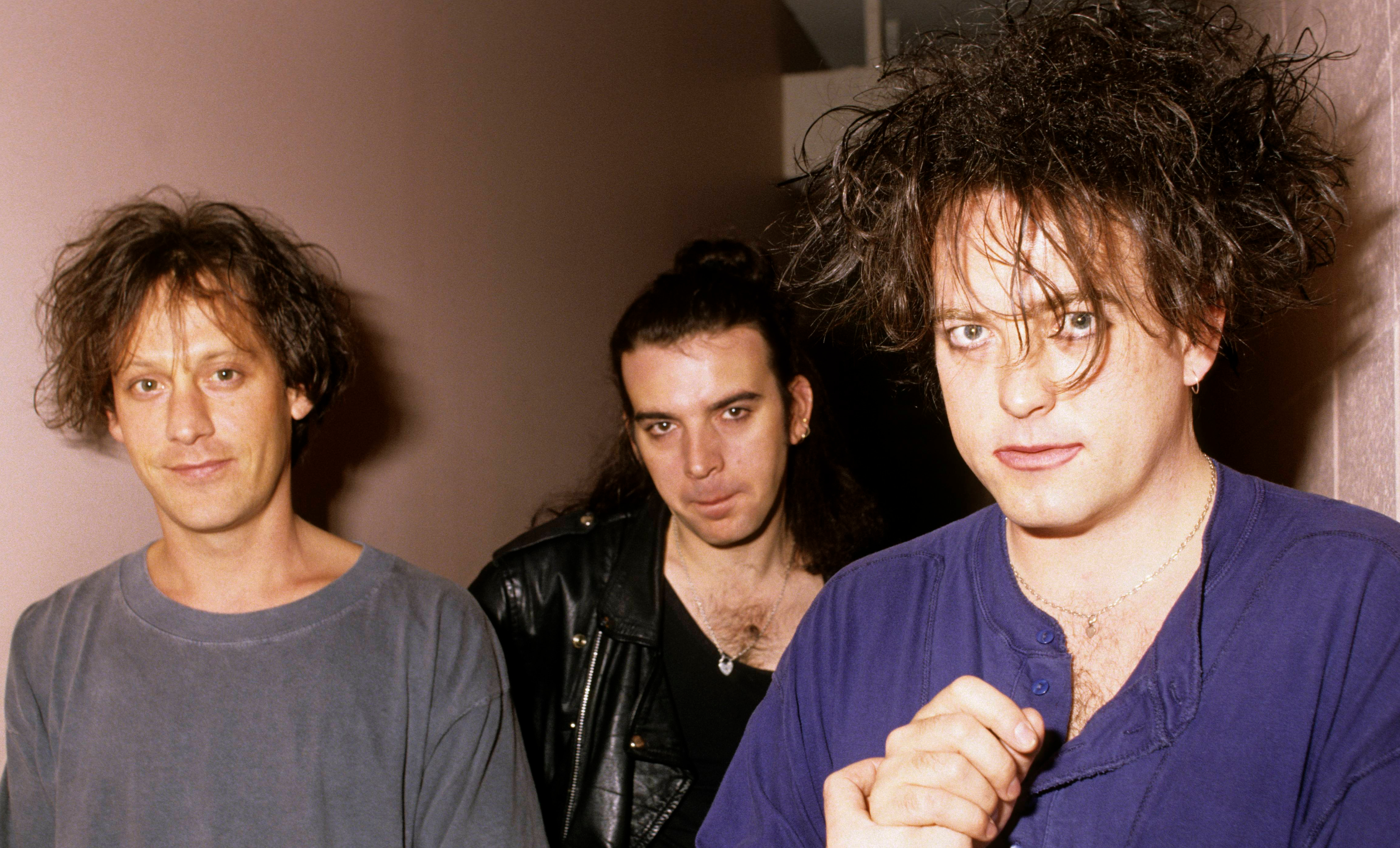 Photo of Robert SMITH and Simon GALLUP and Perry BAMONTE and CURE; L-R: Perry Bamonte, Simon Gallup, Robert Smith