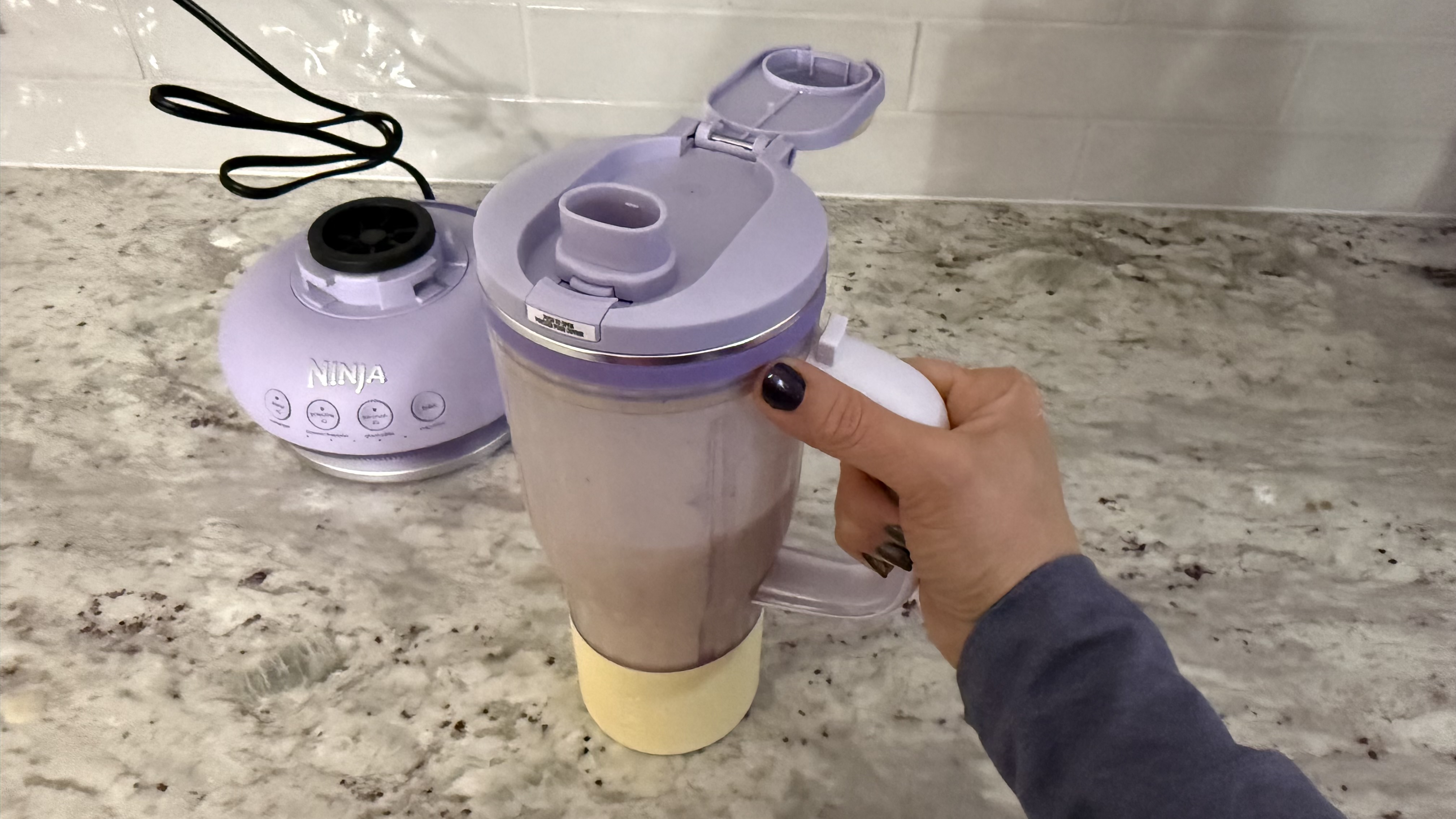 Making a banana smoothie with Ninja BlendBOSS Tumbler Blender
