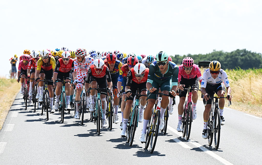 CHATEAUROUX, FRANCE - JULY 13: (L-R) Raul Garcia Pierna of Spain and Team Arkea - B&B Hotels, Jonathan Milan of Italy and Team Lidl - Trek - Green Sprint Jersey, Neilson Powless of The United States and Team EF Education - EasyPost and Remco Evenepoel of Belgium and Team Soudal Quick-Step - White best young jersey compete during the 112th Tour de France 2025, Stage 9 a 174.1km stage from Chinon to Chateauroux ) / #UCIWT / on July 13, 2025 in Chateauroux, France. (Photo by Dario Belingheri/Getty Images)