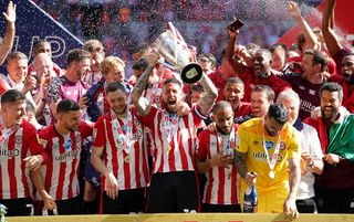 Brentford celebrating promotion at Wembley