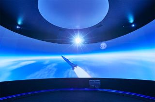 "Space Adventure: The Arrival of Man on the Moon," a touring exhibition, opens with a 180-degree video to welcome visitors.