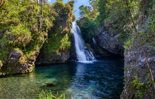 Hanawi waterfall which is situated right by the side of the Road to Hana highway,Hana,Maui,Hawaii,USA