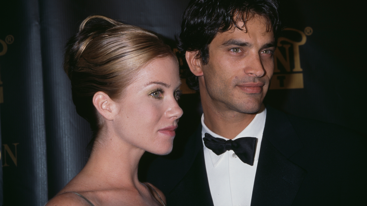 American actress Christina Applegate and American actor Johnathon Schaech attend the 50th Annual Primetime Emmy Awards, held at the Shrine Auditorium in Los Angeles, California, 13th September 1998.