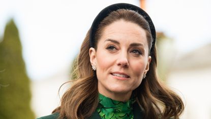 Catherine, Duchess of Cambridge walks in the gardens during a meeting at Áras an Uachtaráin on March 03, 2020 in Dublin, Ireland