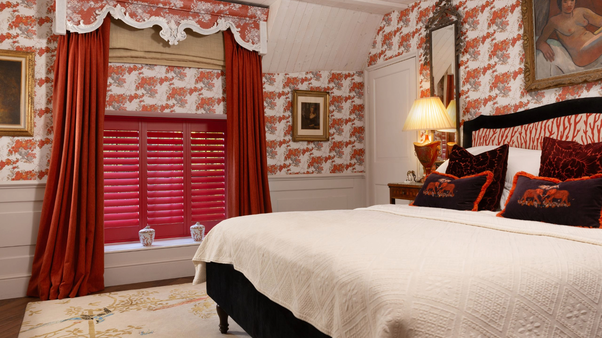 Chintz wallpaper in flamboyant bedroom
