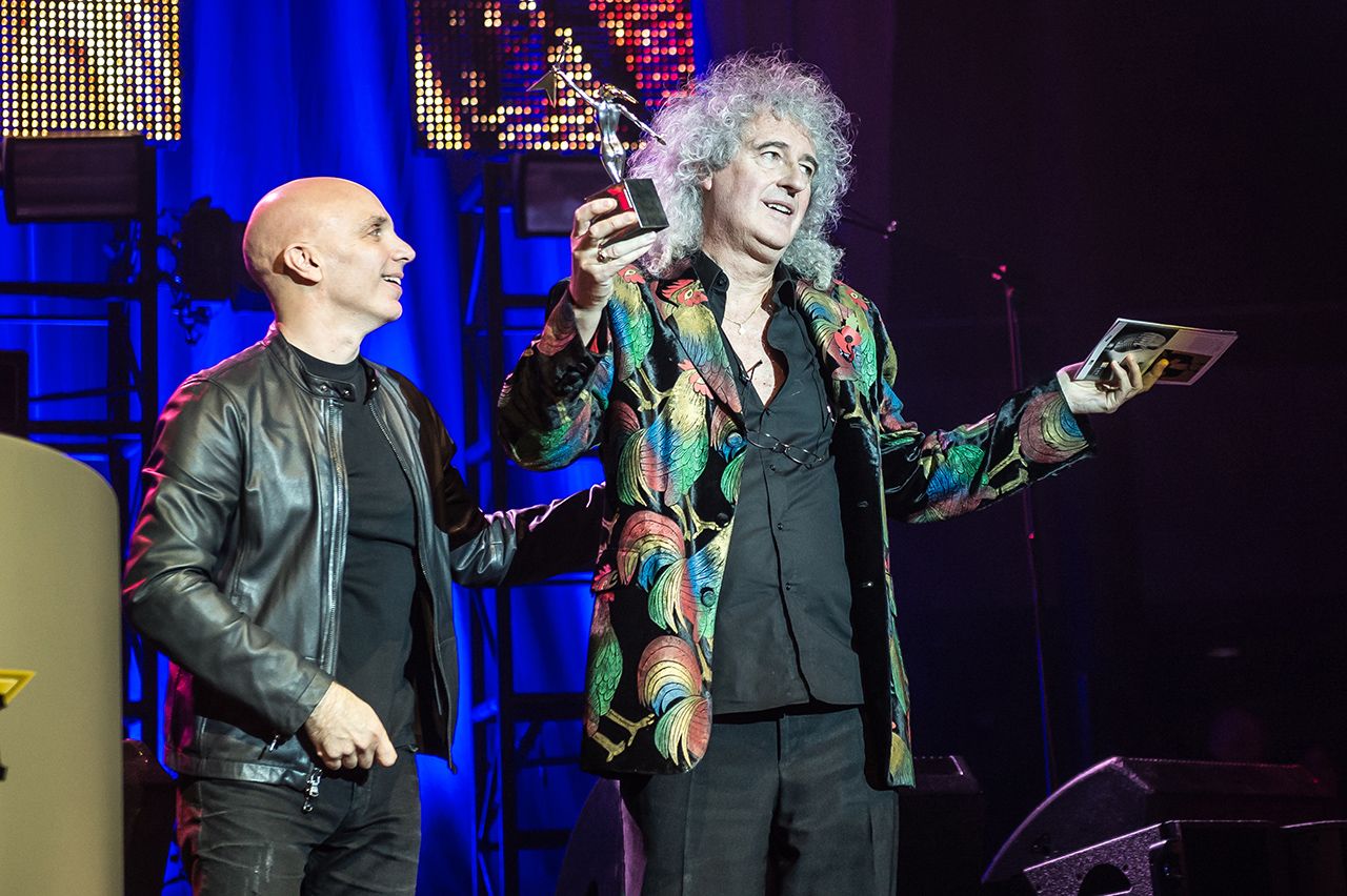 Joe Satriani presents Brian May with Queen's Living Legend award