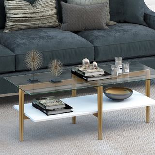 A two-tiered rectangular coffee table with a white shelf and a glass shelf