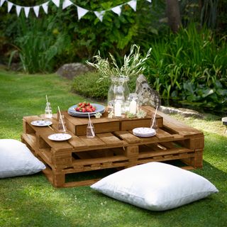 garden with wooden coffee table
