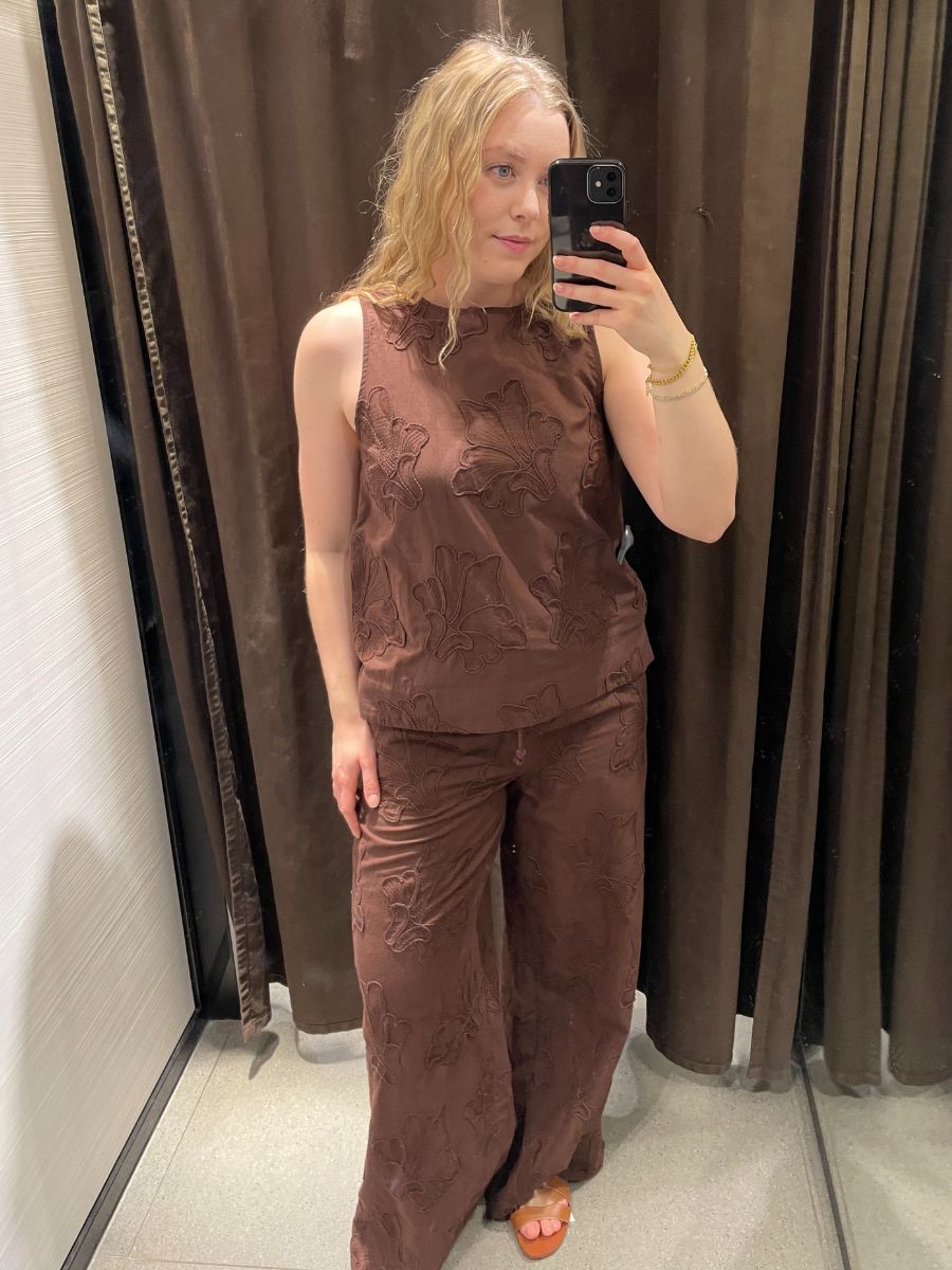 Woman wears brown embroidered top and trouser co-ord