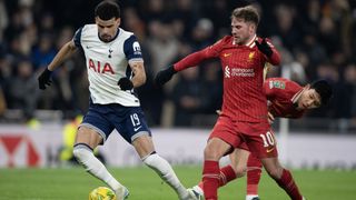 Dominic Solanke of Tottenham Hotspur and Alexis Mac Allister of Liverpool during the Carabao Cup Semi Final First Leg match between Tottenham Hotspur and Liverpool